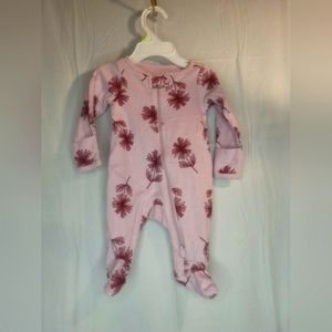 Girl's Newborn Sleeper. Lilac colored with flowers.